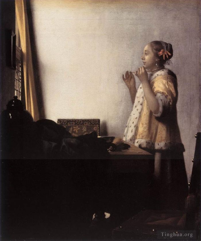 Johannes Vermeer Peinture à l'huile - Femme au collier de perles